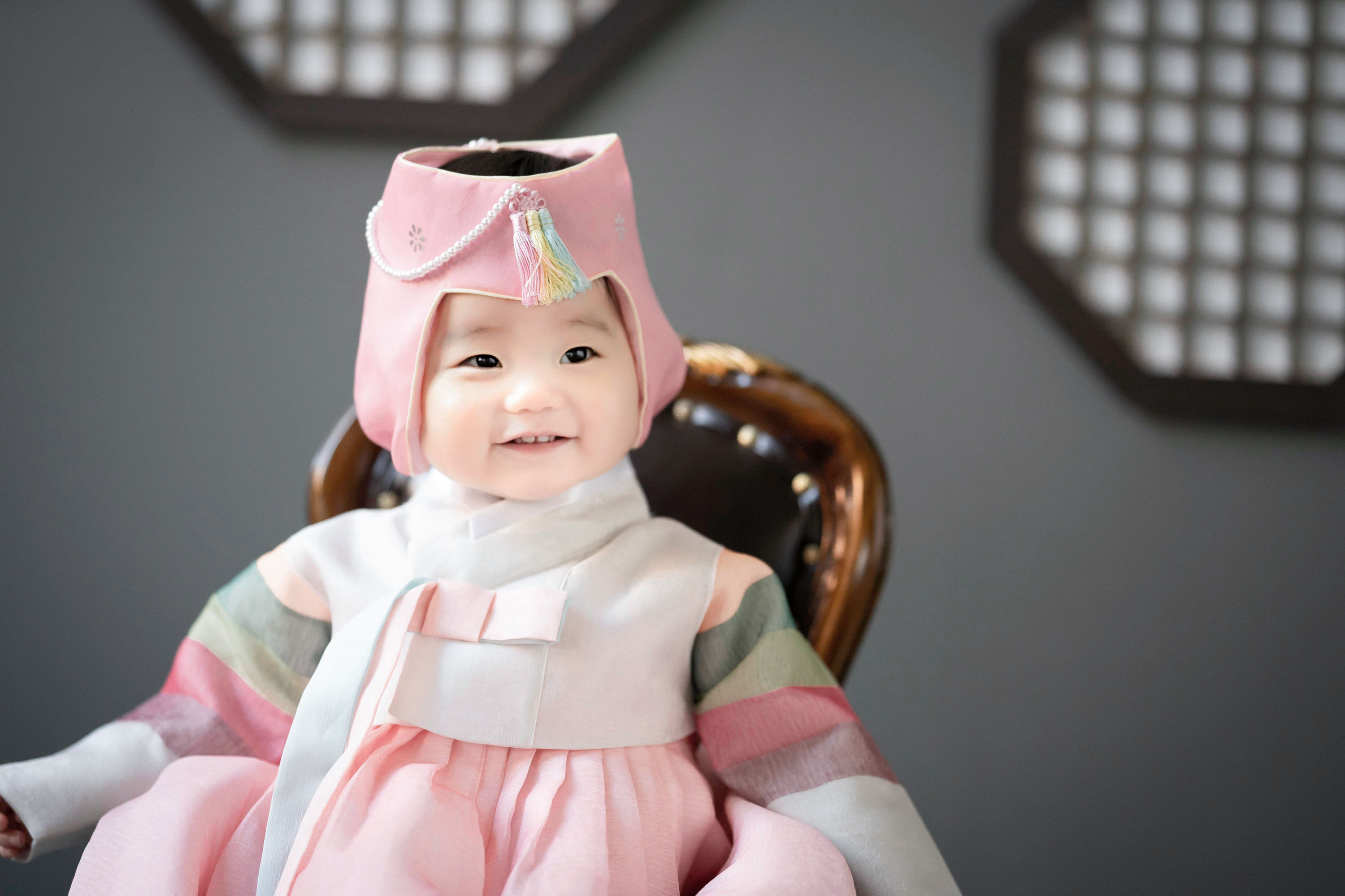 Young child wearing a pink hanbok