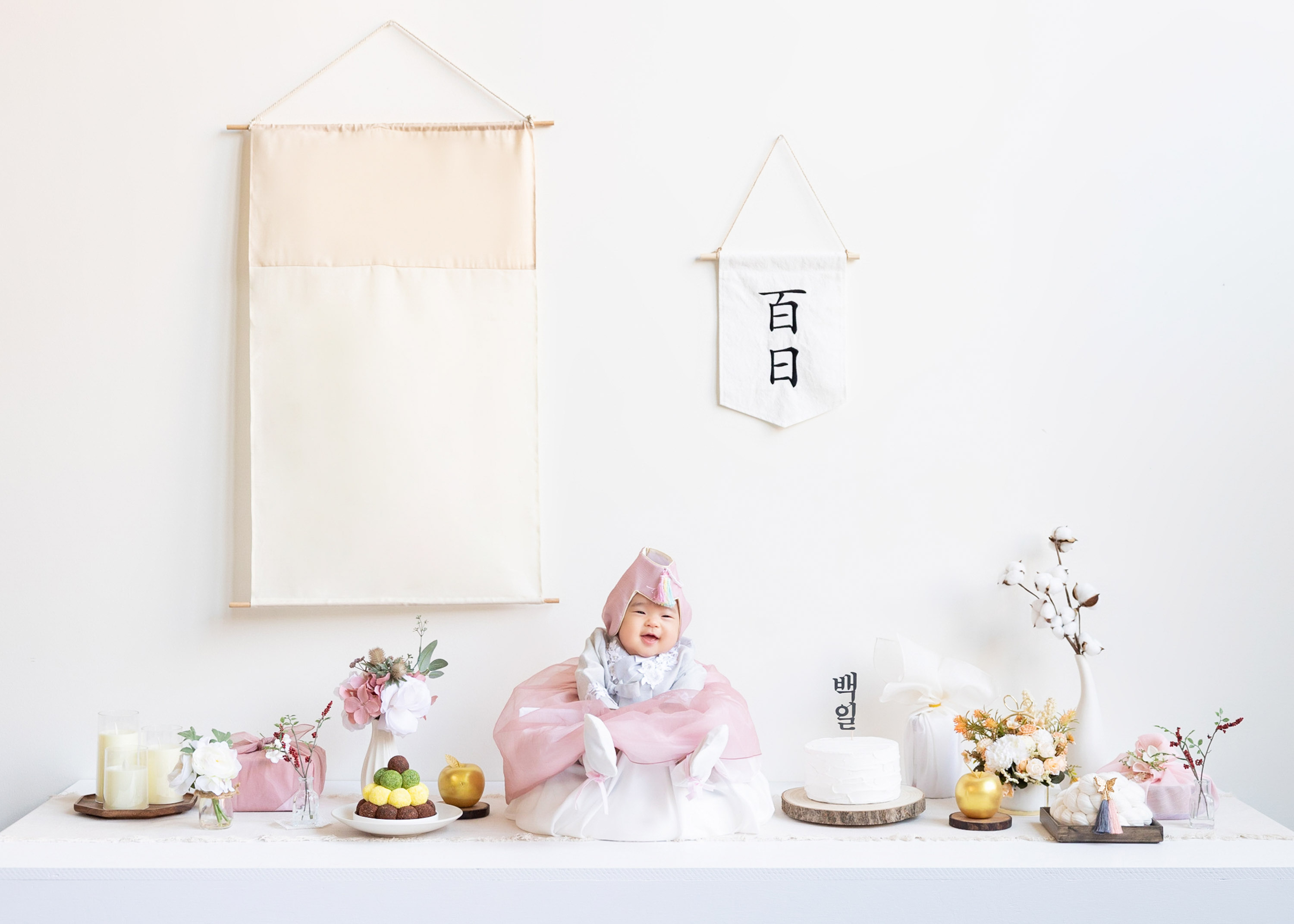 Baby at a 100-day portrait setting