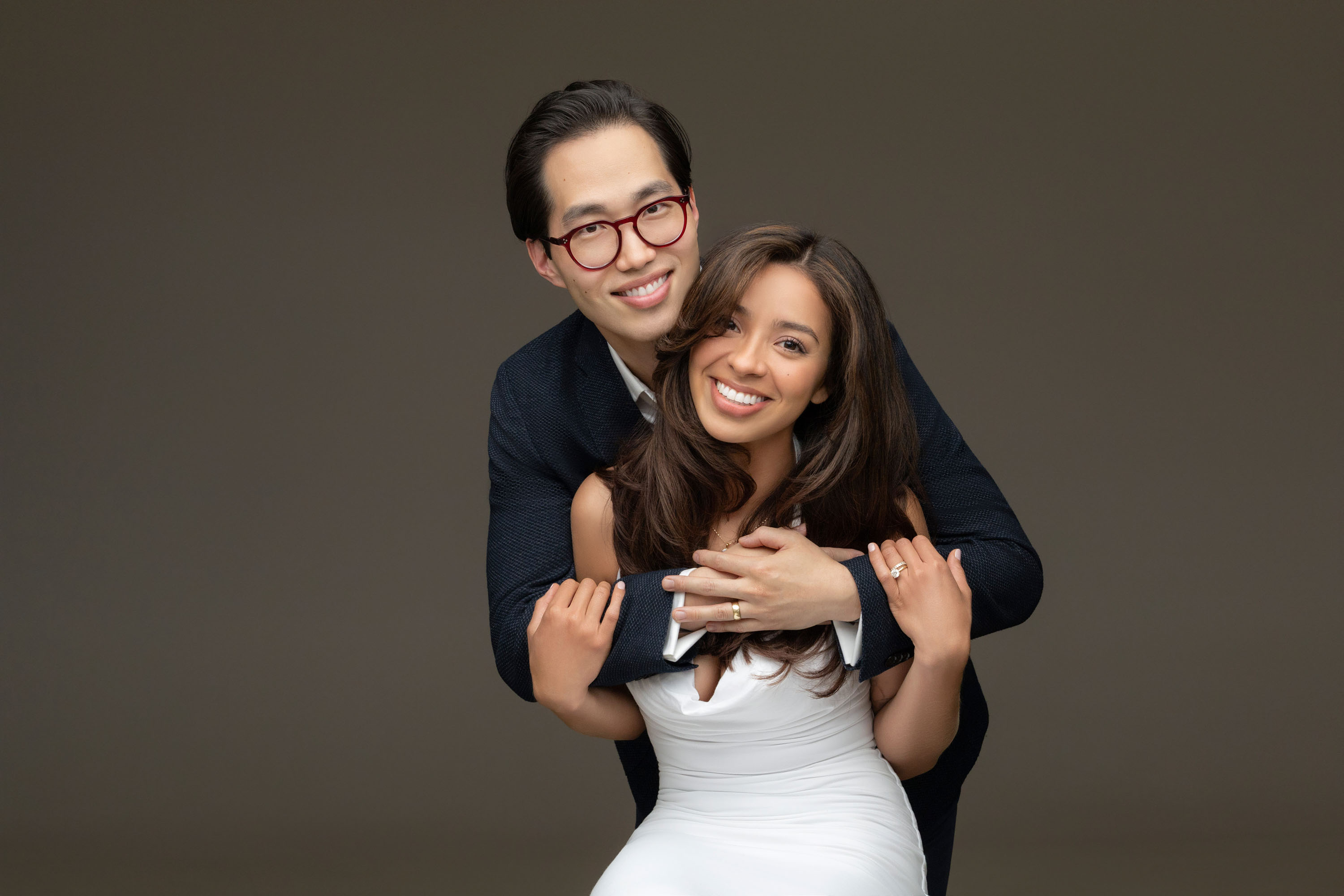 Couple embracing in a studio portrait