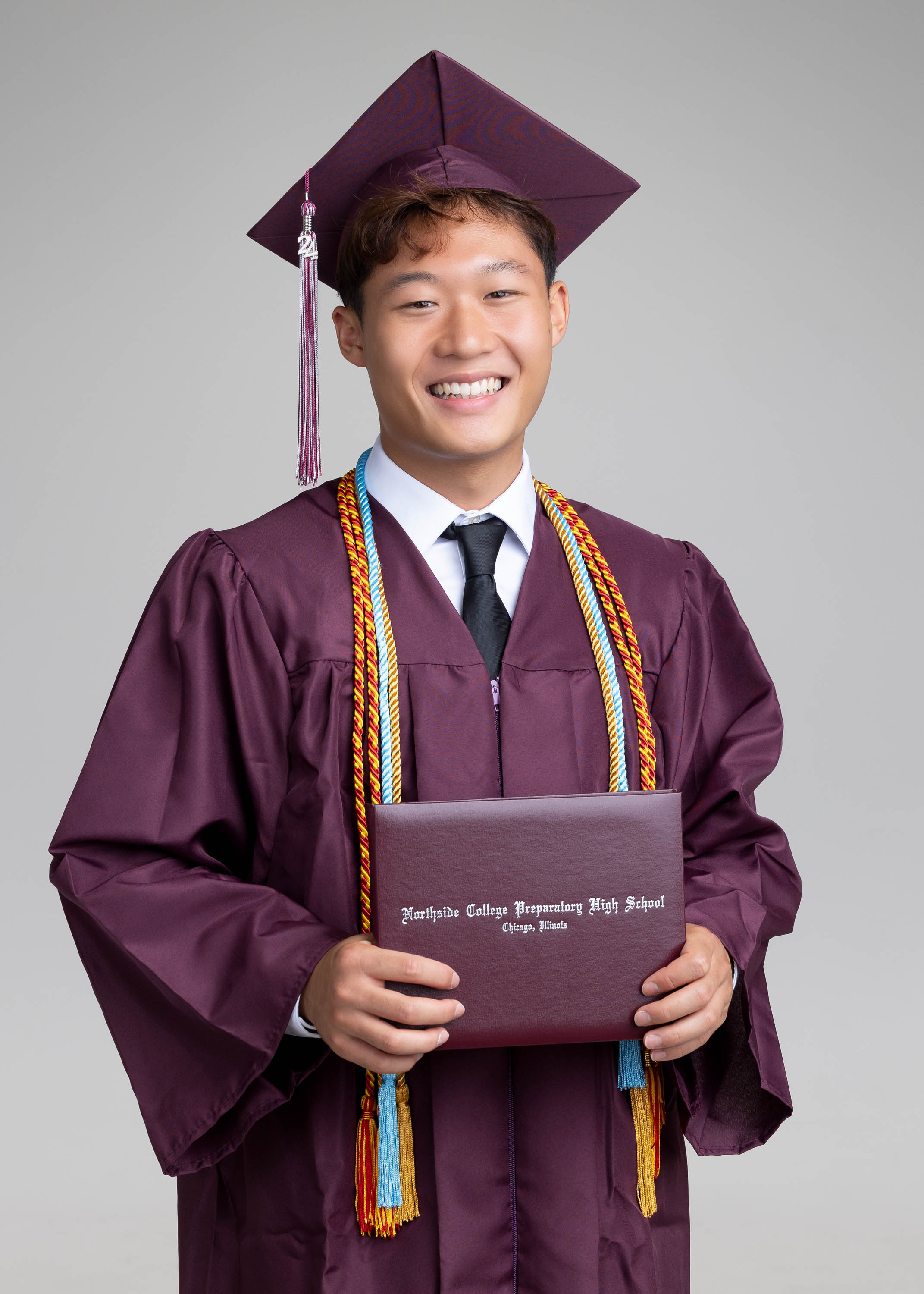 Graduate photographed for a milestone portrait